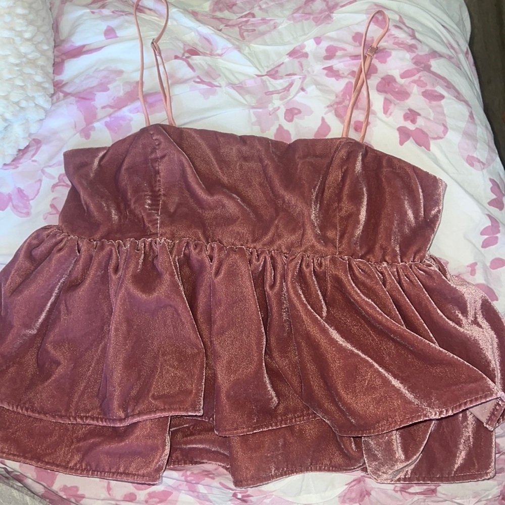 Size small, soft fabric, from urban, and very cute
